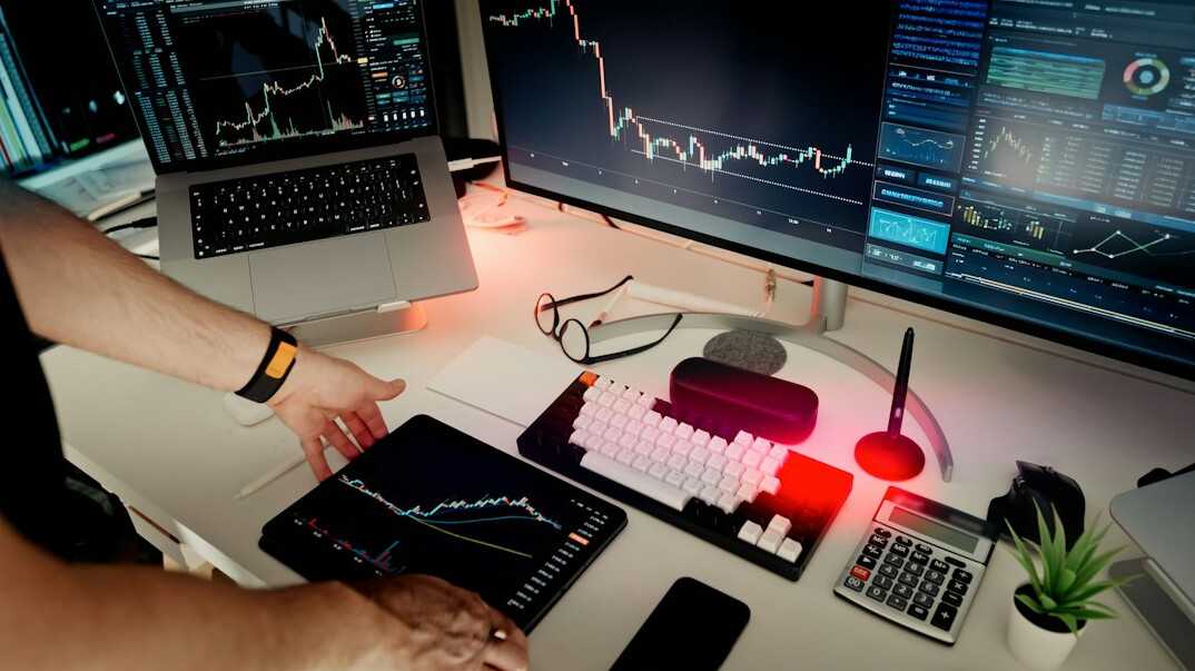 person analyzing charts